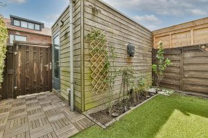 Minimalistic bright and landscaped backyard with dining area